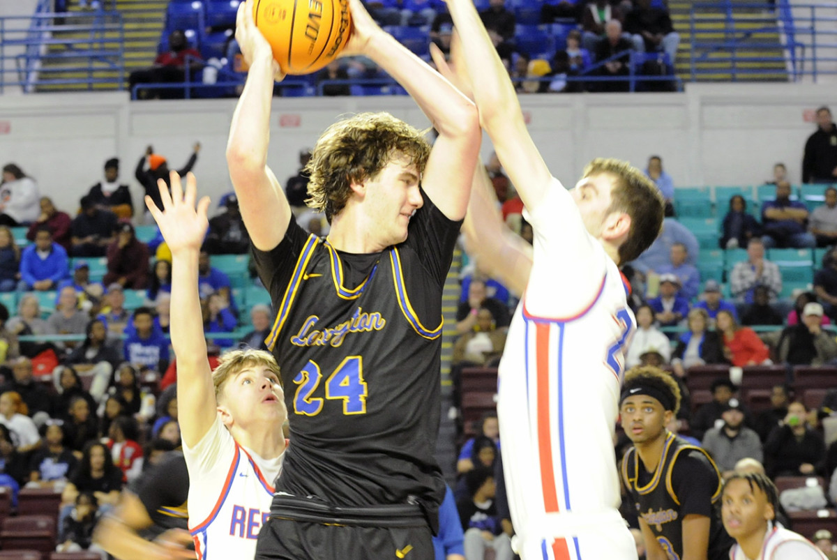Lexington forward Caleb Campbell (24) secures a rebound during the 2024 SCHSL Class 5-A Boys Basketball State Championship Game. (3/1/2024)
